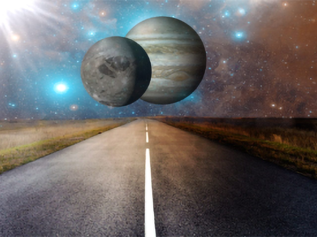 Deux planètes côte à côte au-dessus d’une route bitumée